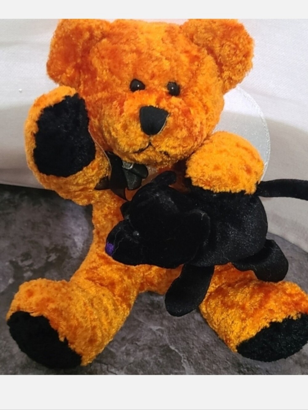 Orange Halloween Bear Holding Black Cat 7" Plush Halloween Decor Is in good pre